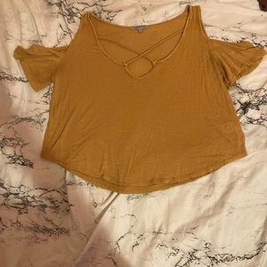 This is a very cute flowy shirt with a little bit of a crop to it